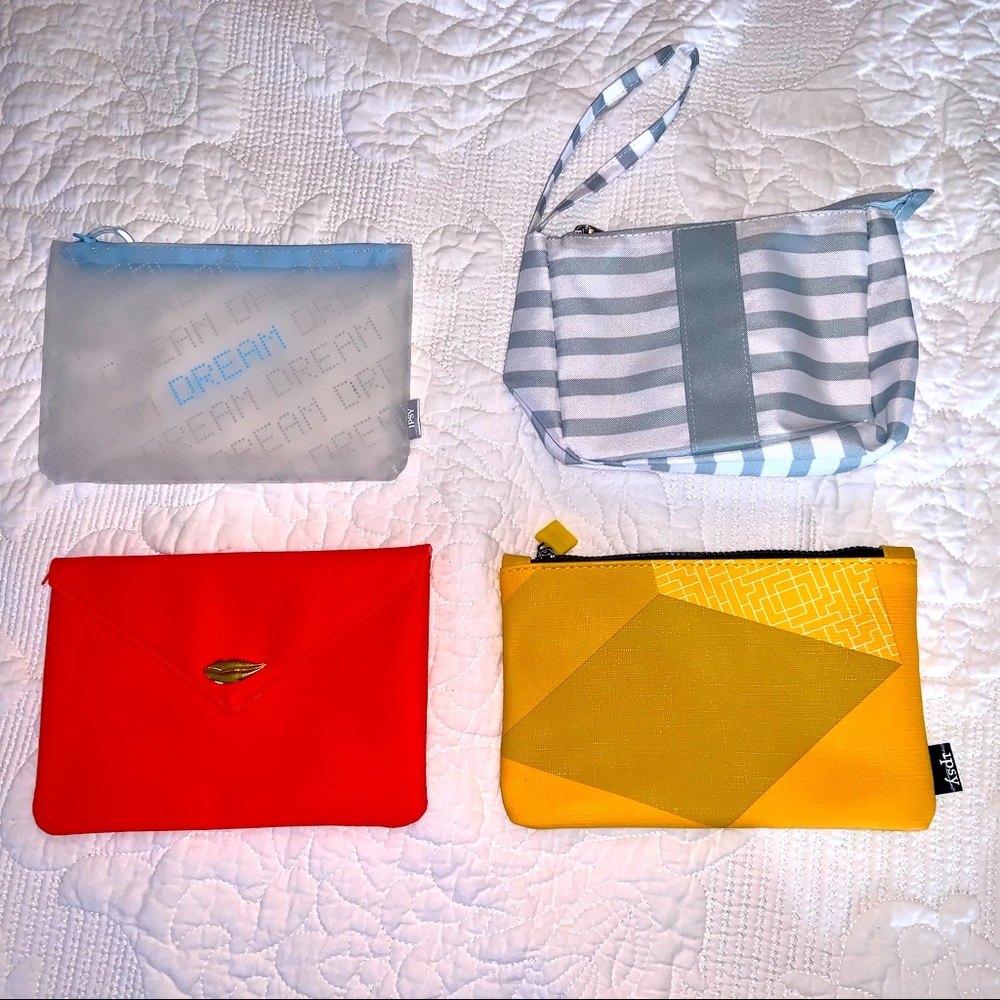 Set 4 Ipsy bags NEW